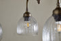 Kakira Chandelier Pendant - Antique Brass & Clear